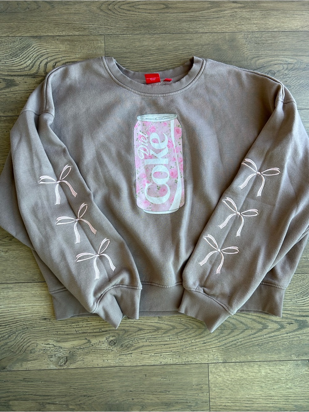 Altar’d State Diet Coke Sweatshirt with Pink Ribbon Detail